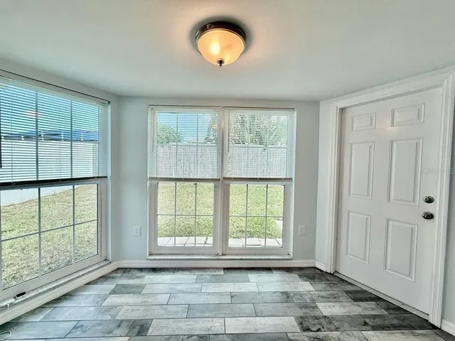 a view of a kitchen with microwave and stove