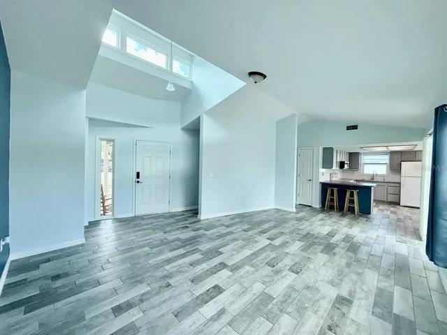 a view of an empty room and window