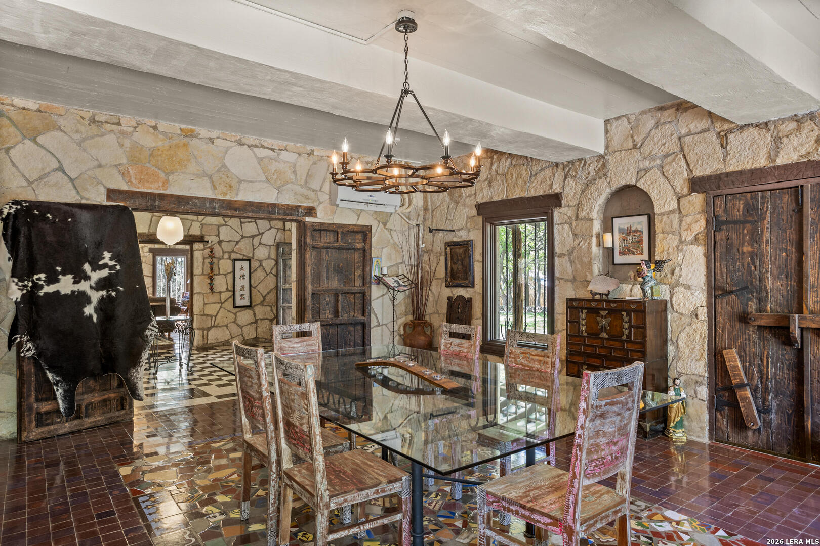 132 Ridge Place Boerne, TX 78006 - Photo 11 of 40 a view of a dining room with furniture and chandelier