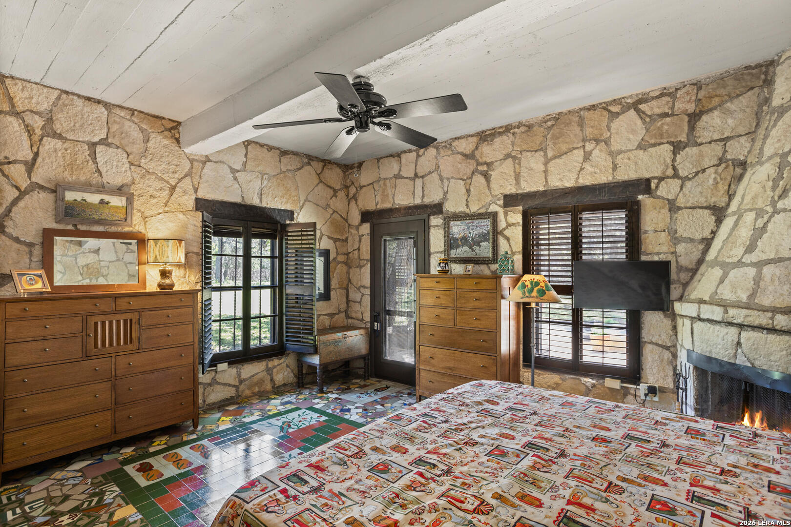 132 Ridge Place Boerne, TX 78006 - Photo 29 of 40 a bedroom with a bed and wooden floor