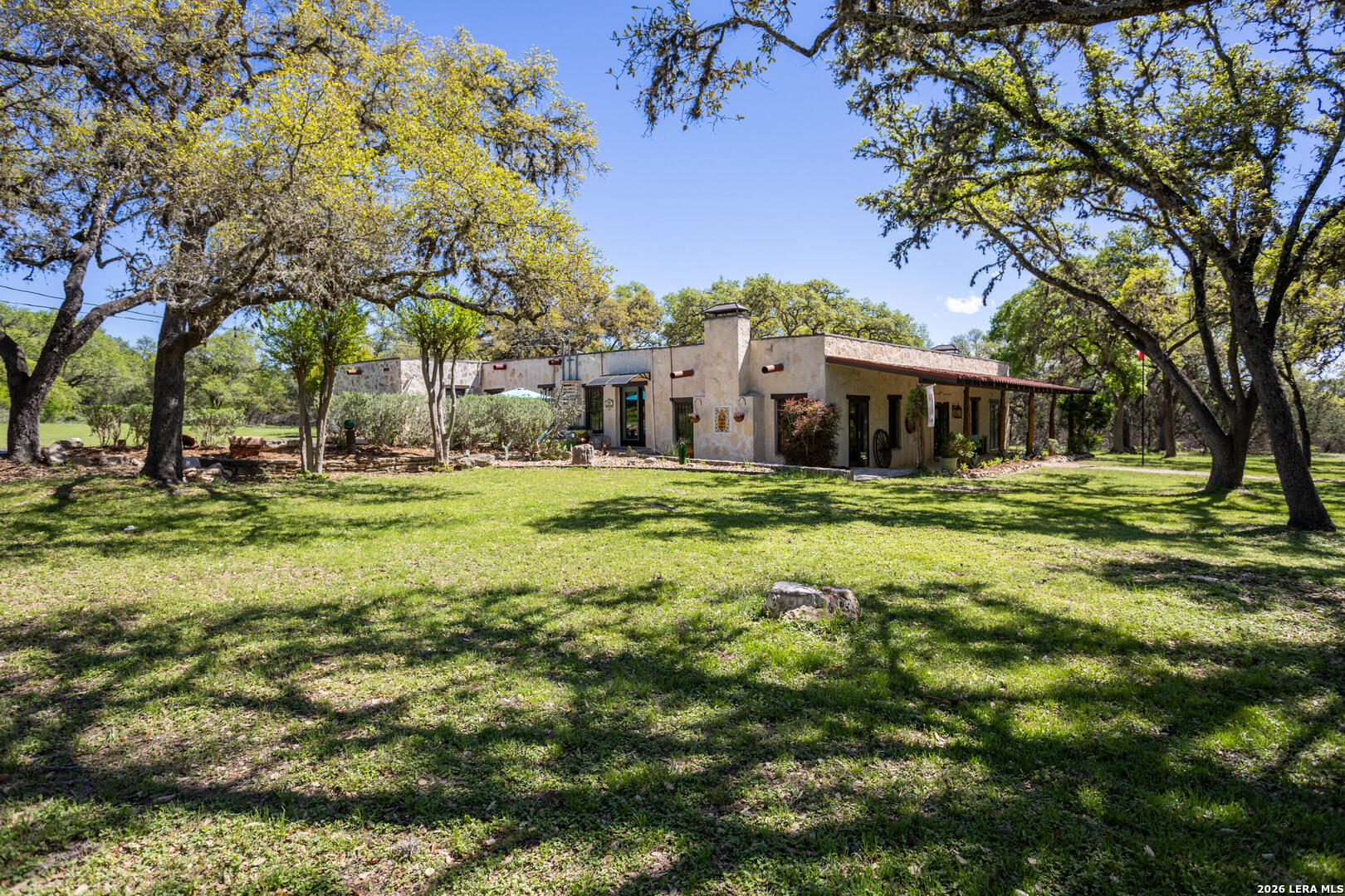 132 Ridge Place Boerne, TX 78006 - Photo 3 of 40 a view of a house with a big yard