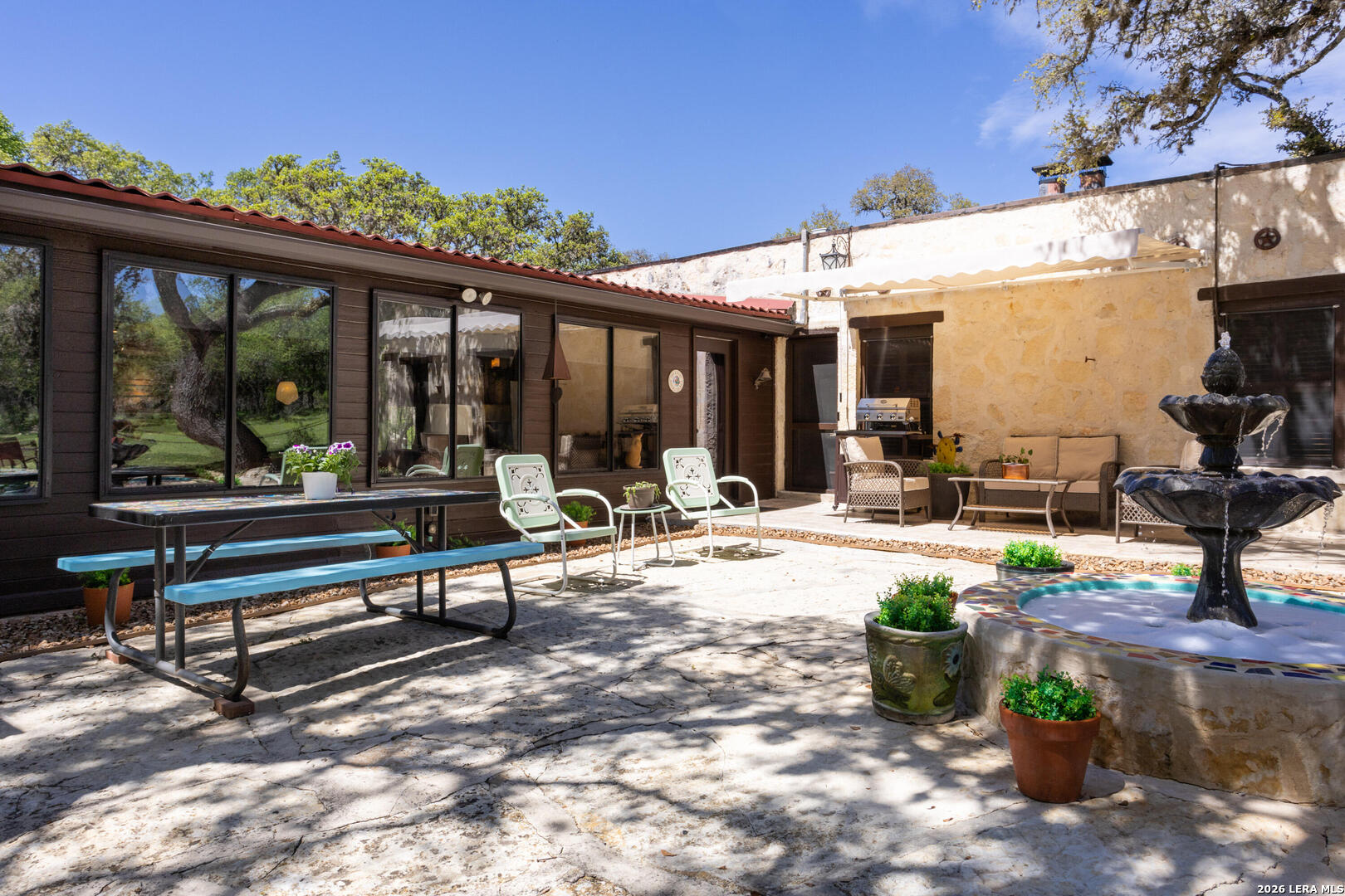 132 Ridge Place Boerne, TX 78006 - Photo 34 of 40 a swimming pool with outdoor seating
