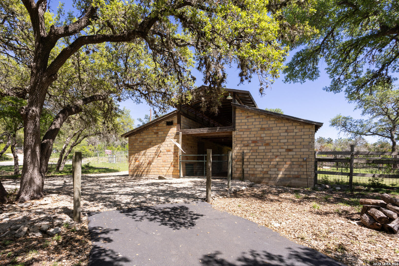 132 Ridge Place Boerne, TX 78006 - Photo 6 of 40 a front view of a house with a yard