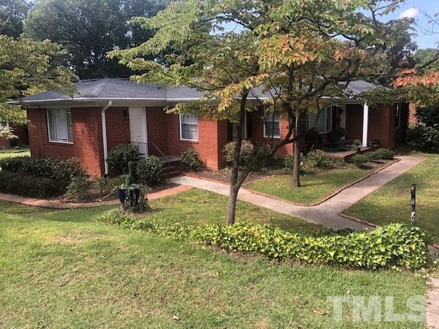 701 Dixie Trail Raleigh, NC 27607 - Photo 2 of 26 a front view of a house with garden