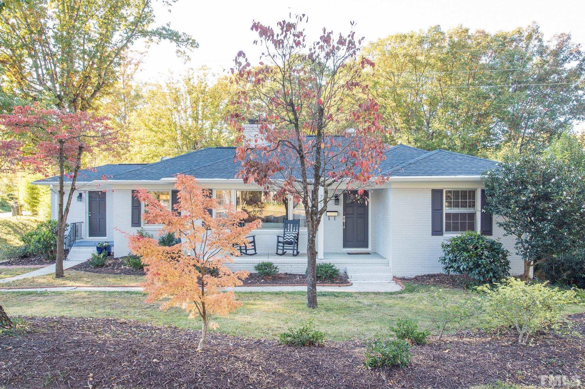 701 Dixie Trail Raleigh, NC 27607 - Photo 14 of 26 a view of a house with a yard