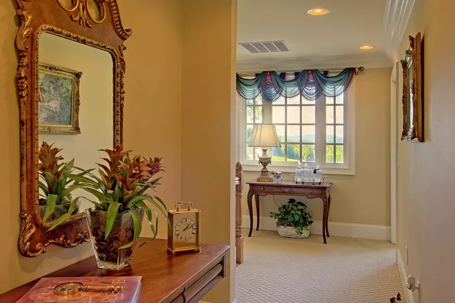 a work room with furniture and a window
