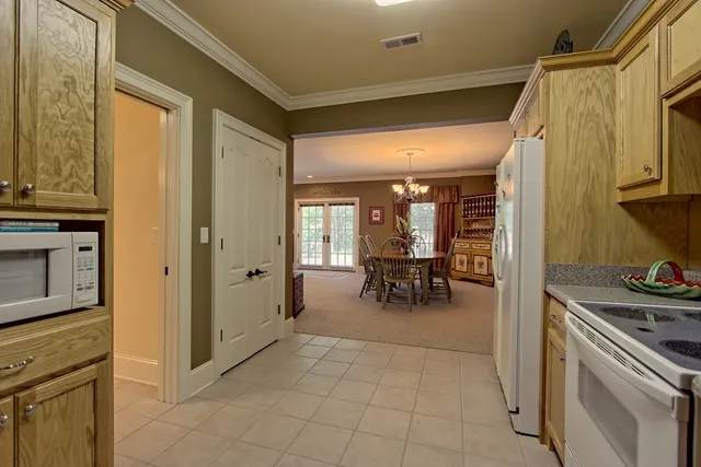 a view of a lake with a yard