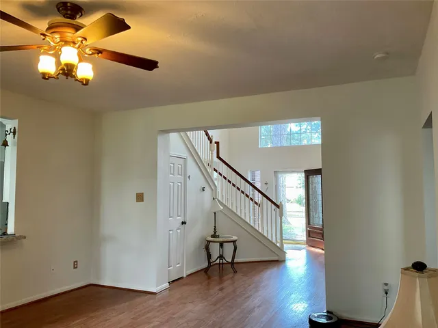 a view of a livingroom with a hardwood floor