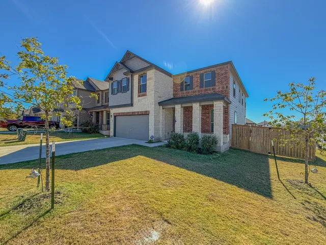 a view of a house with swimming pool