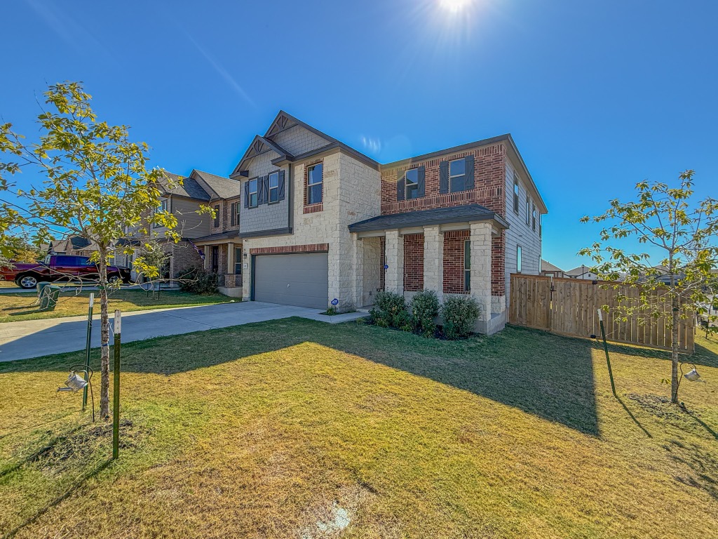 121 Outlaw Drive Jarrell, TX 76537 - Photo 1 of 32 a view of a house with swimming pool