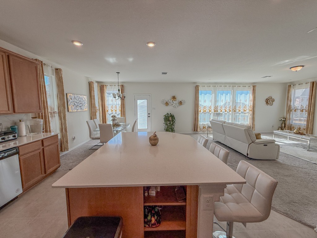 121 Outlaw Drive Jarrell, TX 76537 - Photo 32 of 32 a large white kitchen with a table and chairs