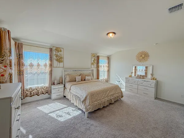 a view of livingroom with hardwood floor and ceiling fan