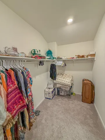 a bathroom with a double vanity sink and mirror