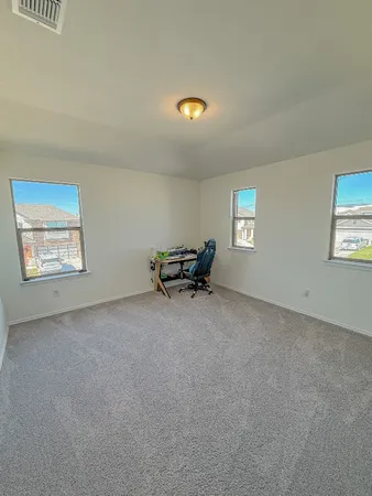 a view of a room with a window