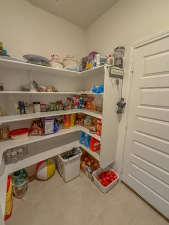 a room with storage and utility