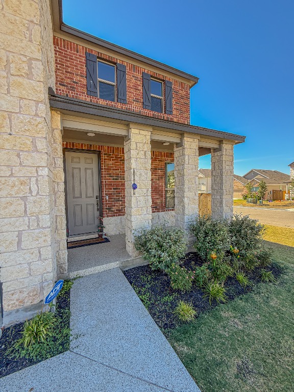121 Outlaw Drive Jarrell, TX 76537 - Photo 4 of 32 a front view of a house with garden