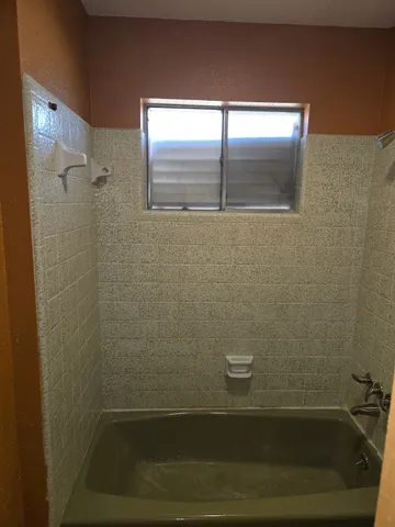 a bathroom with a bathtub