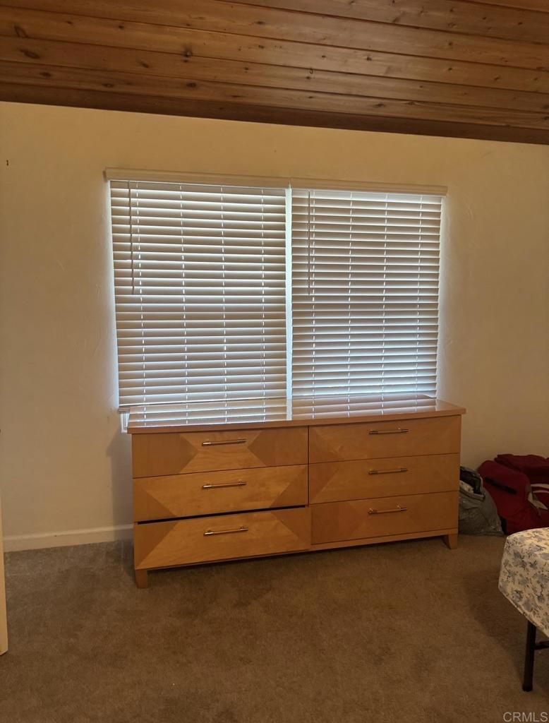 2610 Glebe Road Lemon Grove, CA 91945 - Photo 6 of 8 a view of a bed chair and a window