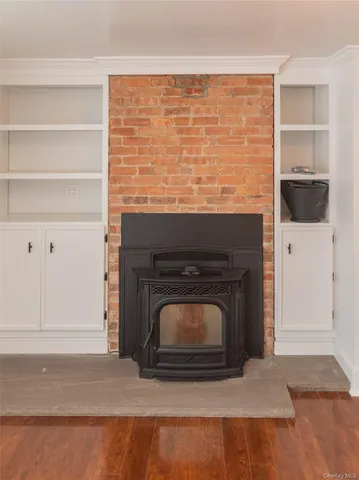 a living room with a fireplace