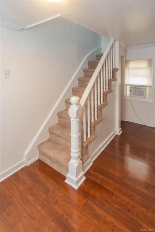 a view of entryway with wooden floor