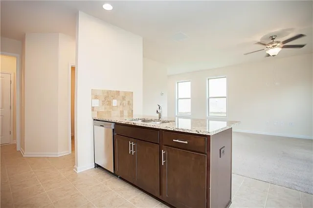 a view of staircase with white walls