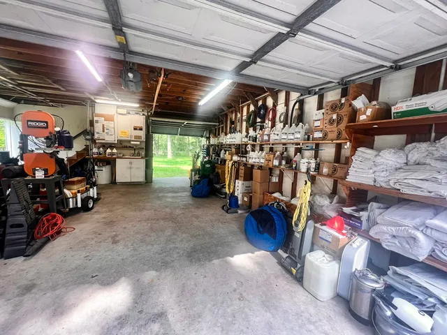 a front view of a house with a yard patio and fire pit