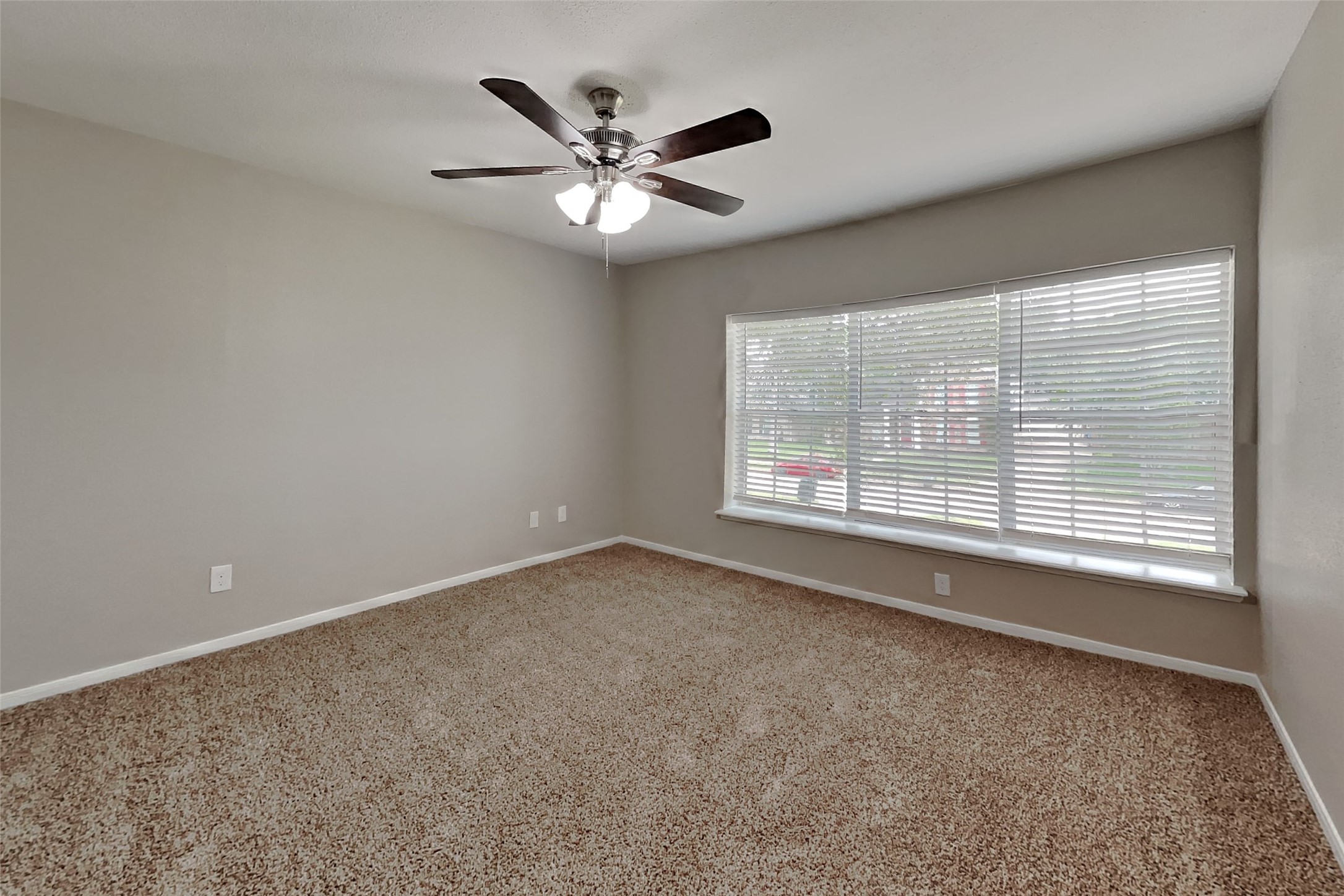 16303 Hickory Point Road Houston, TX 77095 - Photo 15 of 21 a view of an empty room with a window