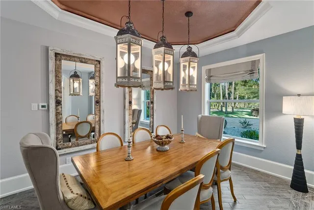 a lobby with furniture and floor to ceiling window
