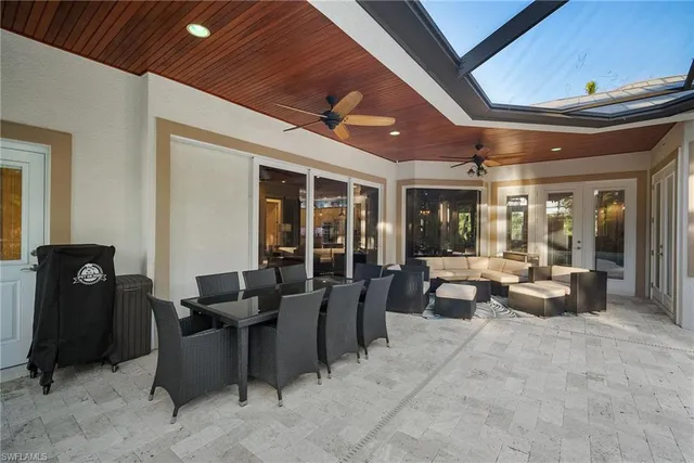 a view of a swimming pool with a patio