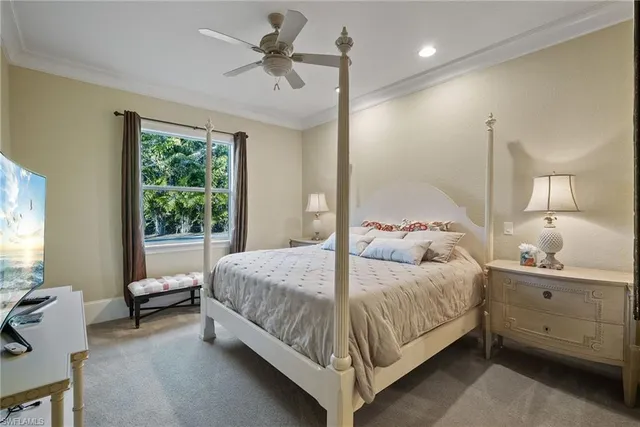 a bathroom with a sink vanity mirror and toilet