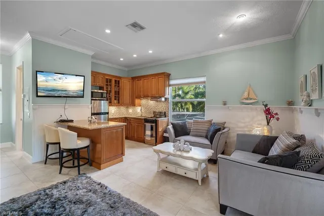 a view of a chair and table in the balcony