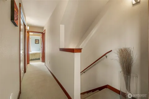 a view of a hallway with staircase
