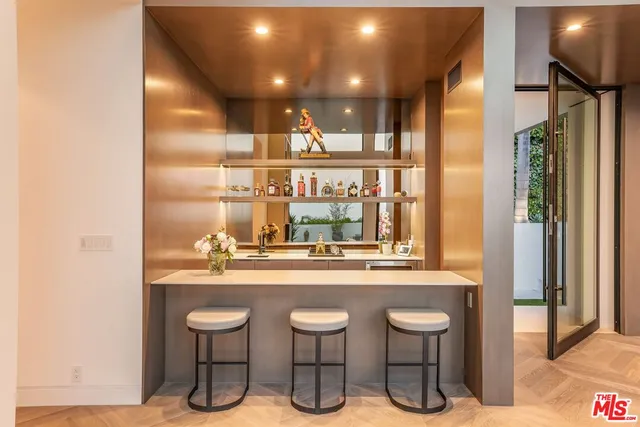 a bedroom with a bed window and couch