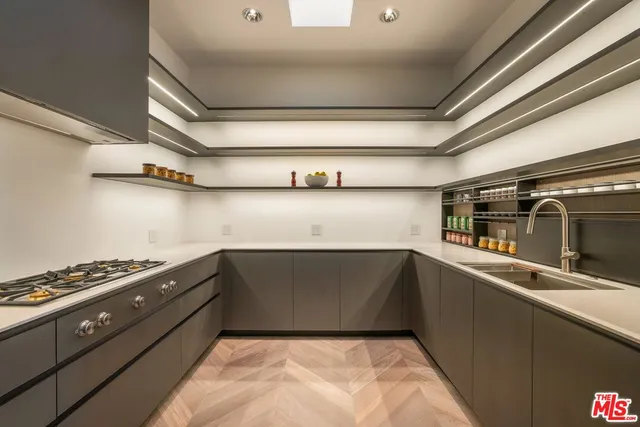 a view of living room with a floor to ceiling window and tree