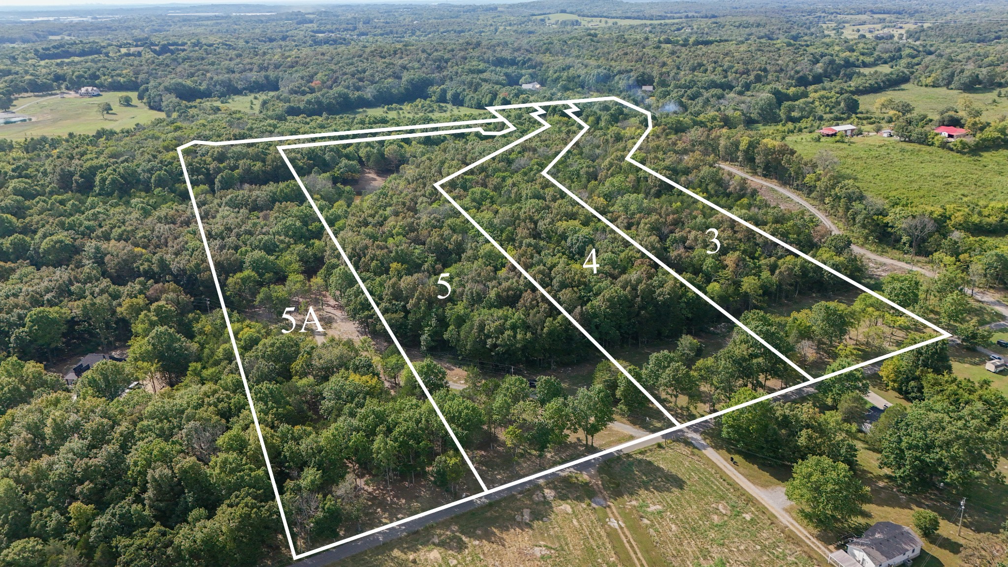 a view of a yard with a ocean view
