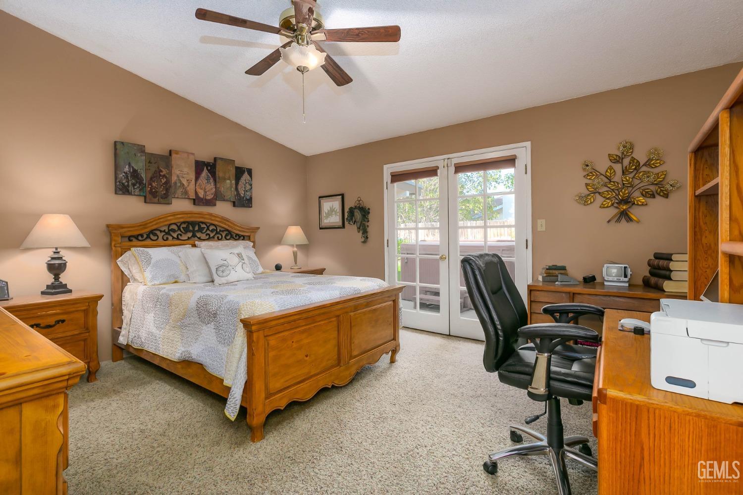 Undisclosed Address Bakersfield, CA 93312 - Photo 22 of 27 a bedroom with a bed and a desk