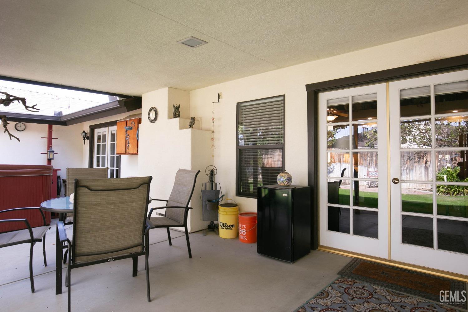 Undisclosed Address Bakersfield, CA 93312 - Photo 8 of 27 a view of a dining room with furniture and a window