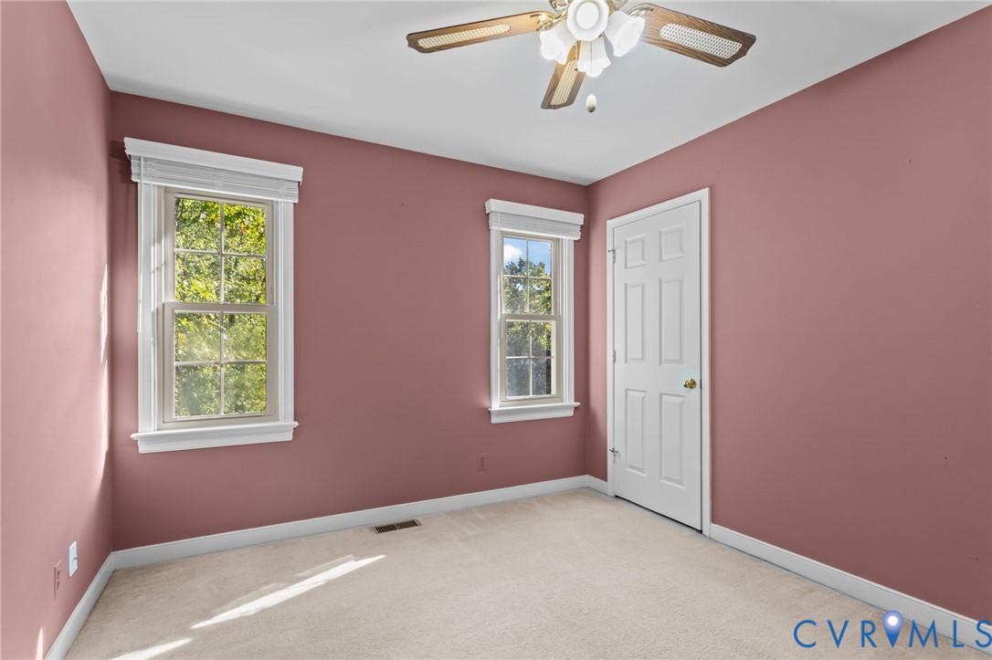 4717 Cedar Cliff Road Chester, VA 23831 - Photo 21 of 46 a view of an empty room with a window