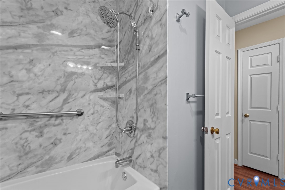 4717 Cedar Cliff Road Chester, VA 23831 - Photo 26 of 46 a bathroom with a bathtub