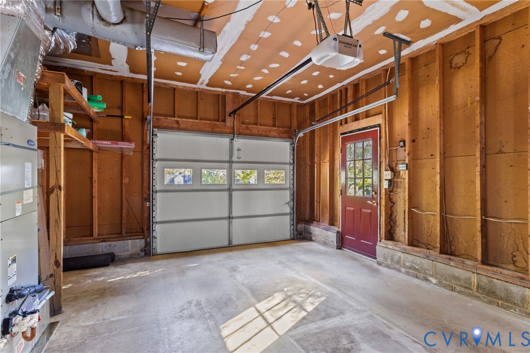 4717 Cedar Cliff Road Chester, VA 23831 - Photo 29 of 46 a view of a garage with wooden walls