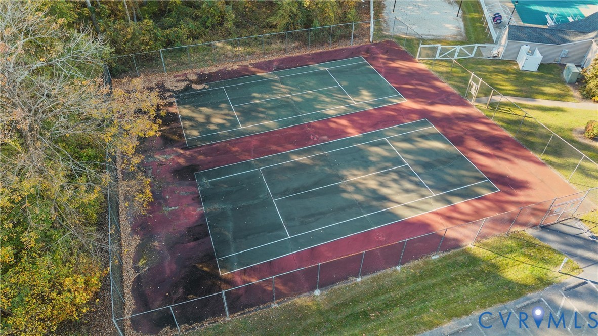 4717 Cedar Cliff Road Chester, VA 23831 - Photo 44 of 46 a view of a tennis ground with large trees