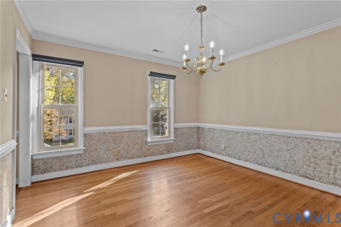 4717 Cedar Cliff Road Chester, VA 23831 - Photo 9 of 46 a view of empty room with wooden floor and fan