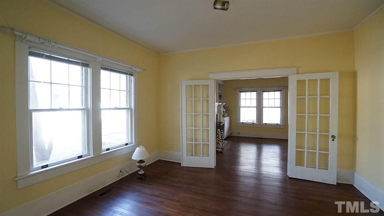 2251 The Circle Raleigh, NC 27608 - Photo 11 of 29 Adjacent to the Living Room is the Study/Office/Studio offering Lots More Living Space to Enjoy Life.