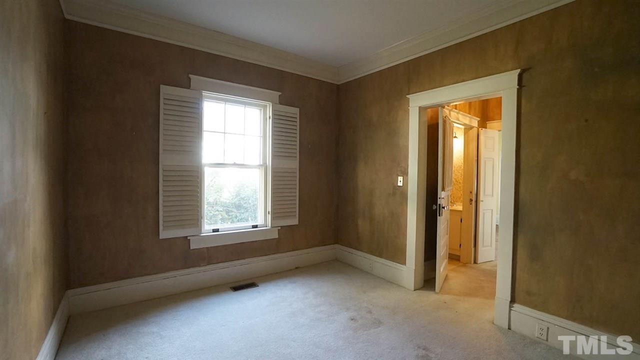 2251 The Circle Raleigh, NC 27608 - Photo 15 of 29 First Floor Bedroom has adjoining Bath