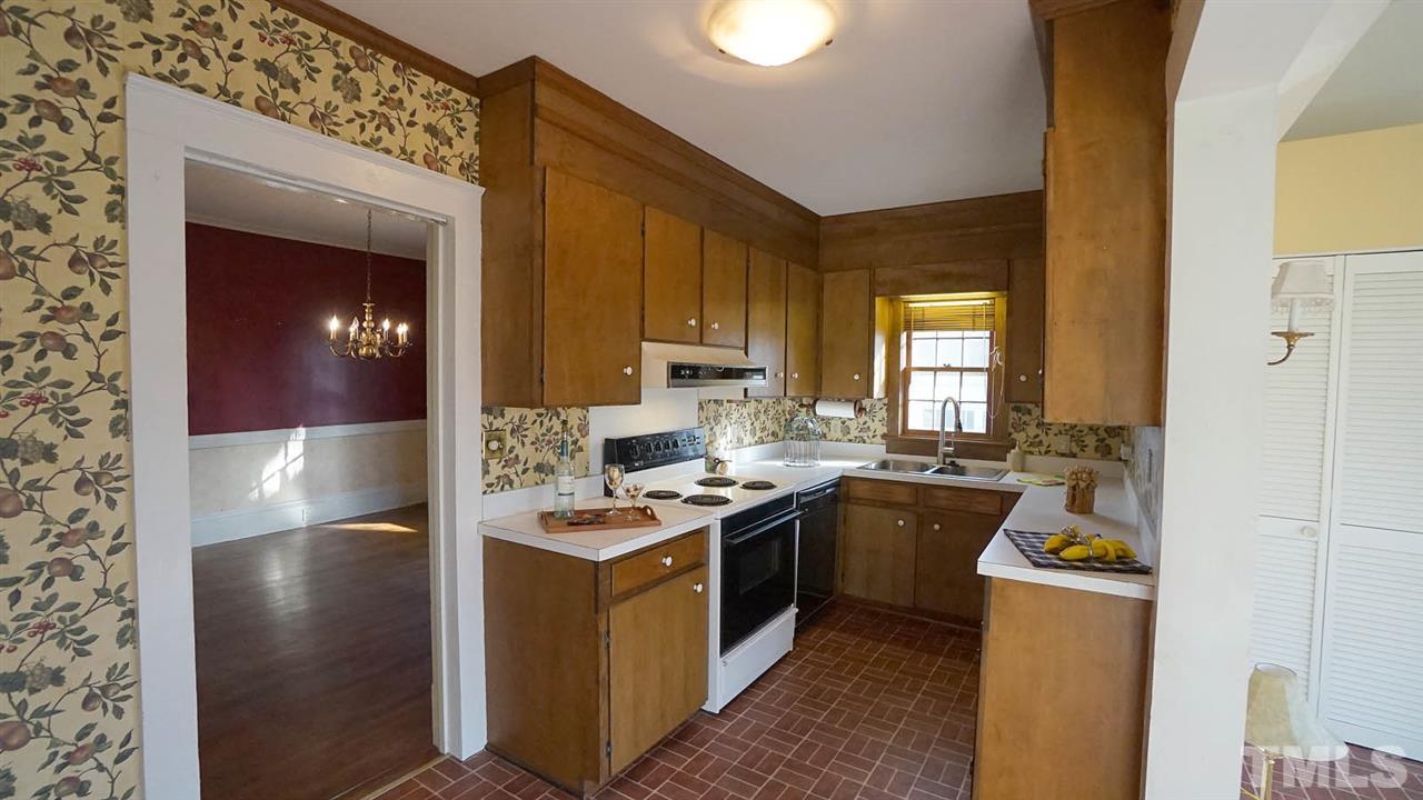 2251 The Circle Raleigh, NC 27608 - Photo 17 of 29 Kitchen is adjacent to Dining Room