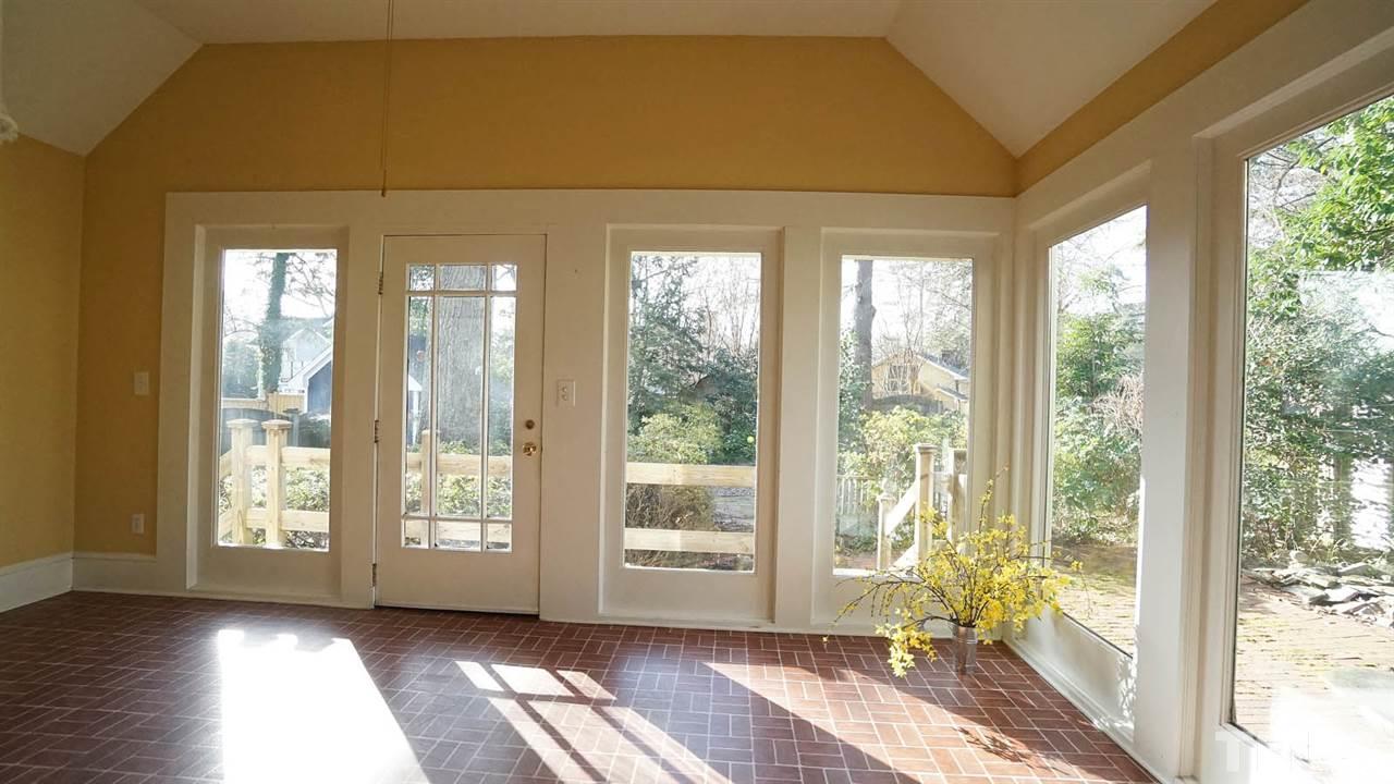 2251 The Circle Raleigh, NC 27608 - Photo 3 of 29 Sunroom with Pizazz -- adjacent to Kitchen