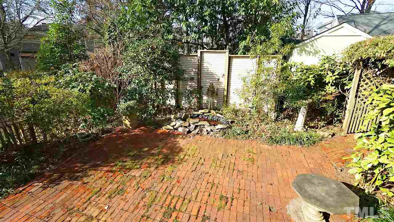 2251 The Circle Raleigh, NC 27608 - Photo 28 of 29 Backyard is nestled among Mature Trees and has a Park-like Setting