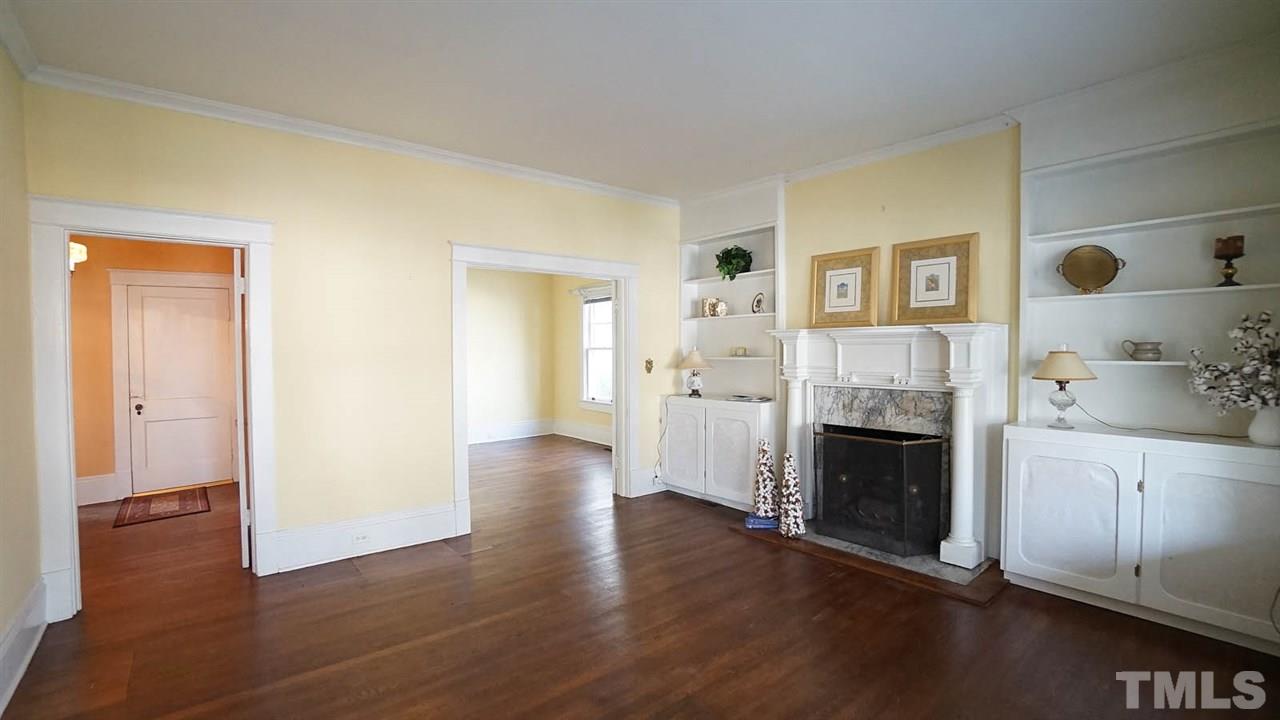 2251 The Circle Raleigh, NC 27608 - Photo 8 of 29 Living Room has Tons of Charm with 9' Ceilings and Hardwood Floors and is adjacent to Study/Office