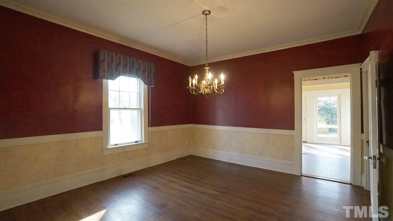 2251 The Circle Raleigh, NC 27608 - Photo 9 of 29 You will Fall in Love with the Generously Sized Dining Room with Great Wall Space to Showcase your Favorite Furniture Pieces