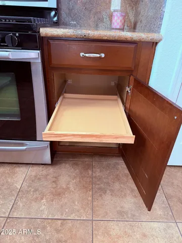 a view of a backyard with plants and trees